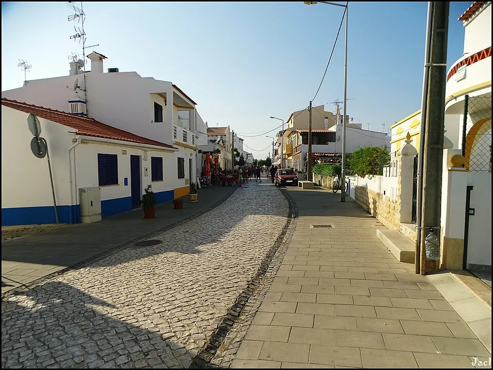 Traditional houses, apartment buildings and local streets in Manta Rota village centre