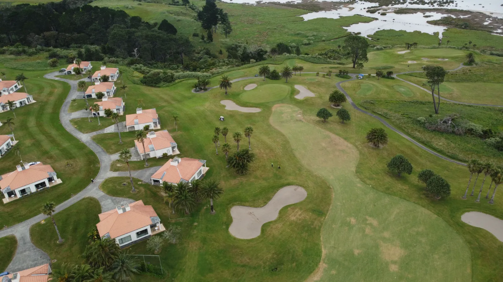Contemporary villas beside a golf fairway in a gated community