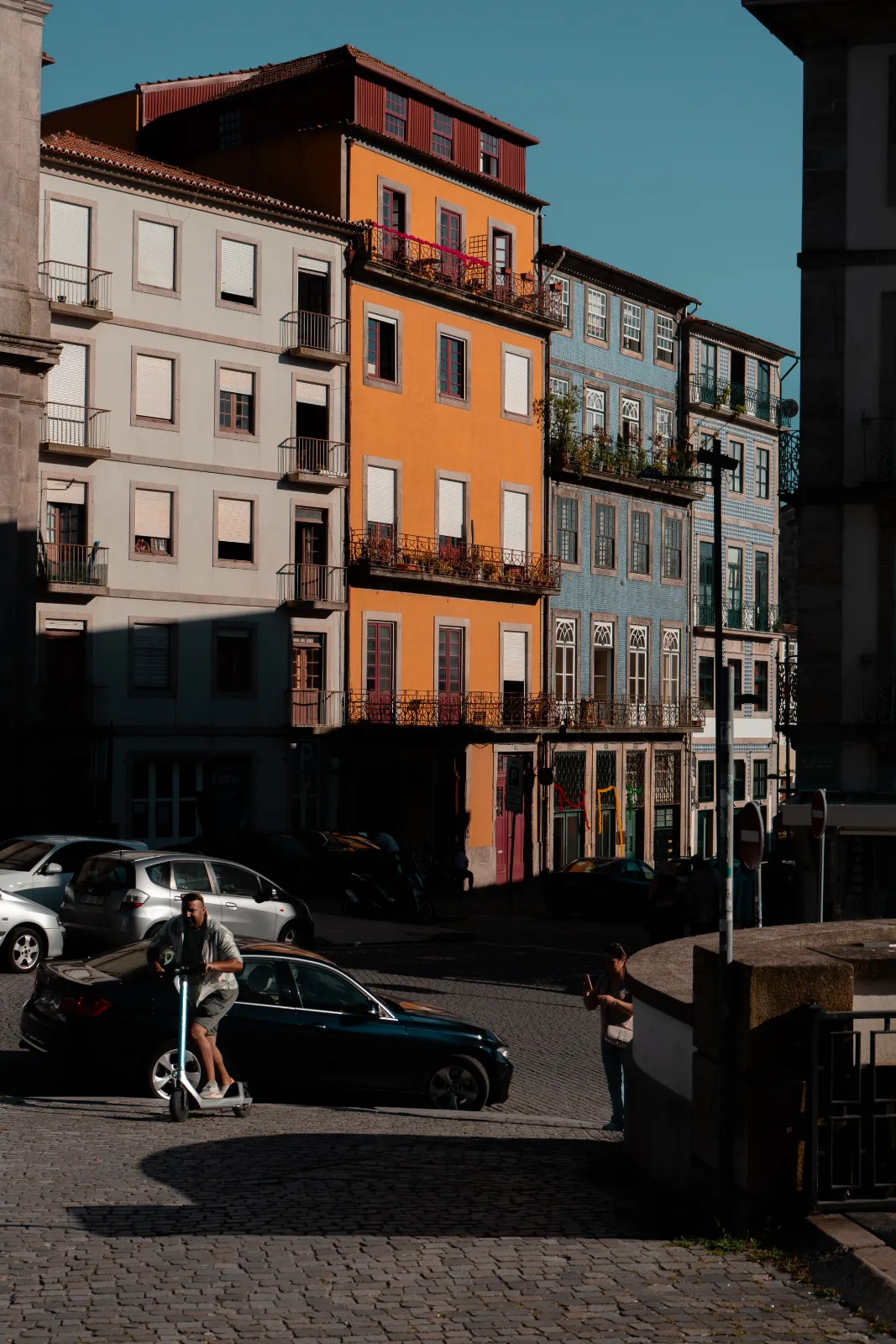 Renovated townhouses on a residential street in Bonfim, Porto
